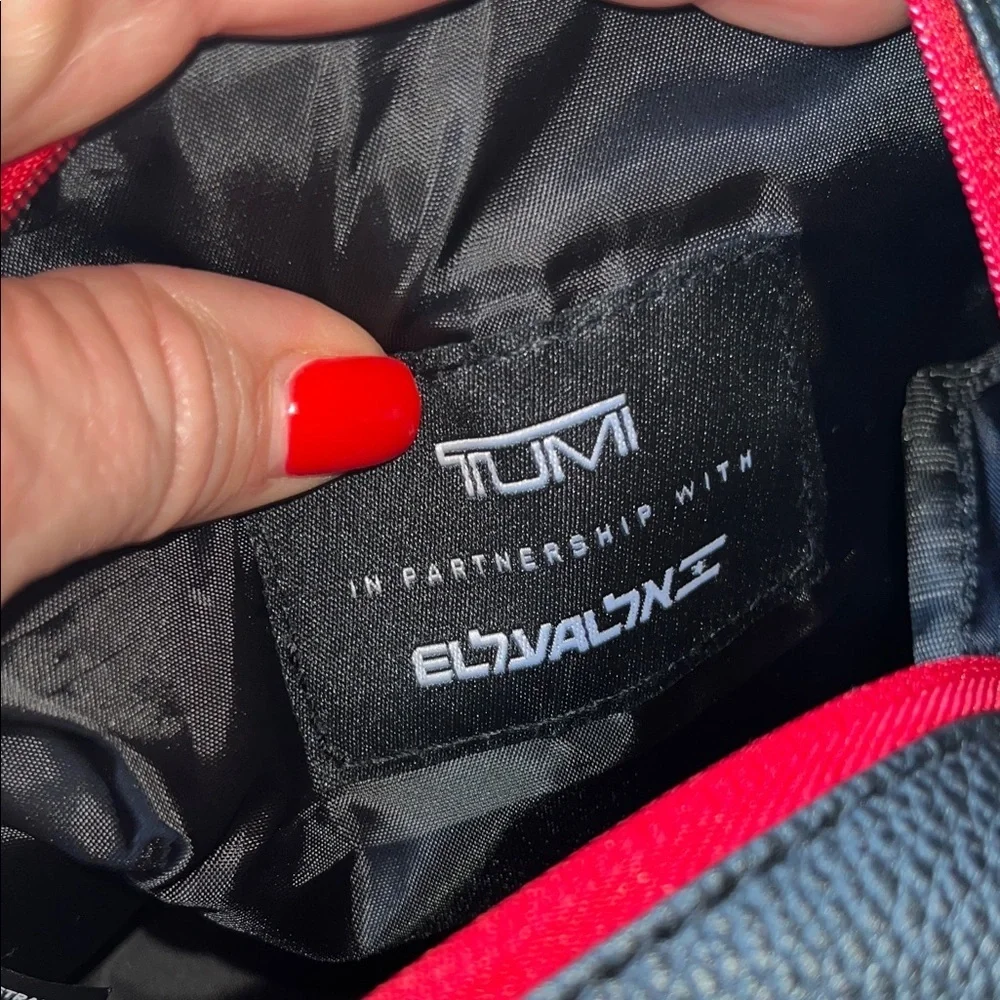 TUMI Textured Black Faux Leather toiletrie / travel bag